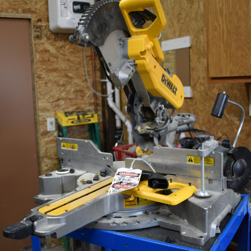 A close up of a chop saw