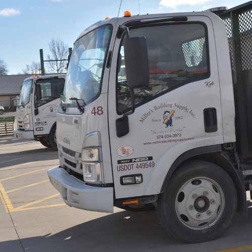 A Miller's Building Supply branded box truck.